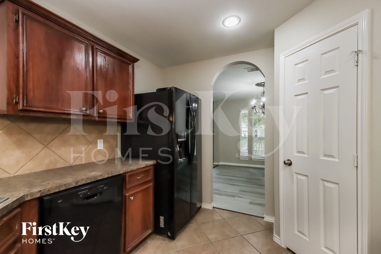 12218 Sunlight Peak Ln - Photo 6 of 16