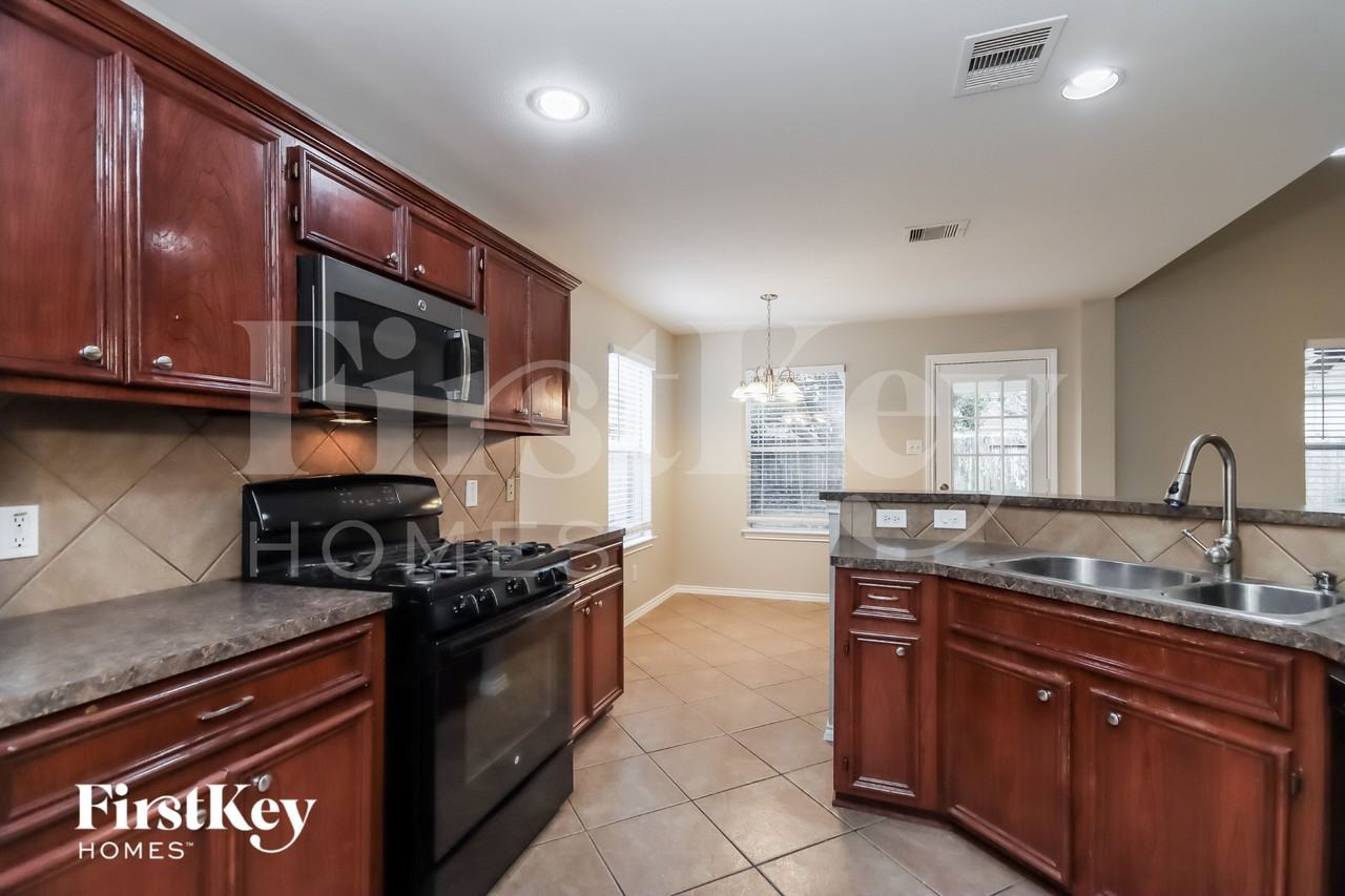 12218 Sunlight Peak Ln - Photo 7 of 16