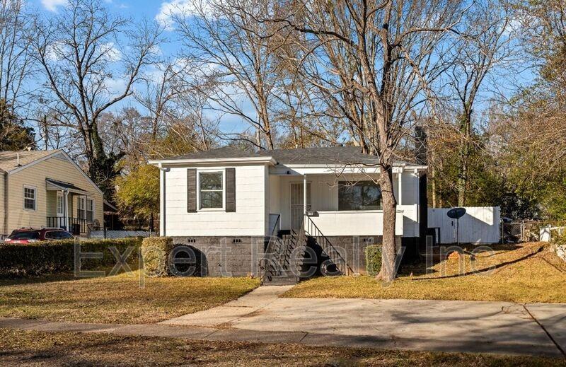 9036 Beverly Dr N - Photo 2 of 11