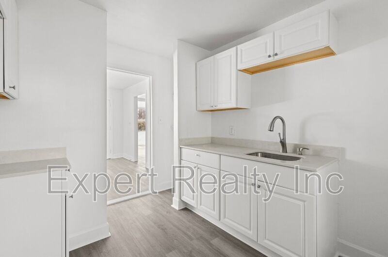 9036 Beverly Dr N - Photo 7 of 11