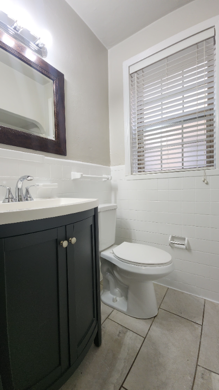 6304 Bancroft Ave #1stFL - Photo 7 of 13
