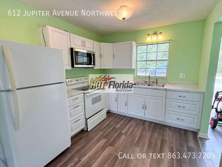 612 Jupiter Ave Nw - Photo 3 of 13