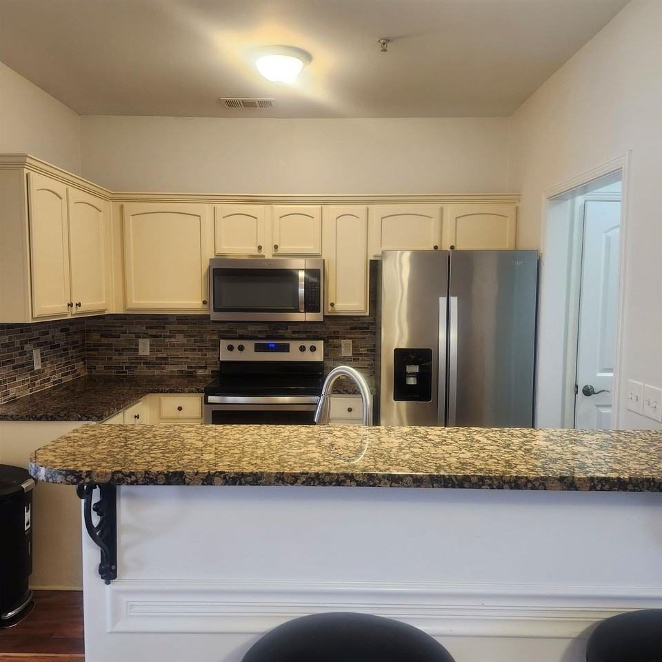 1497 Castle Pines Cir #18 - Photo 5 of 23