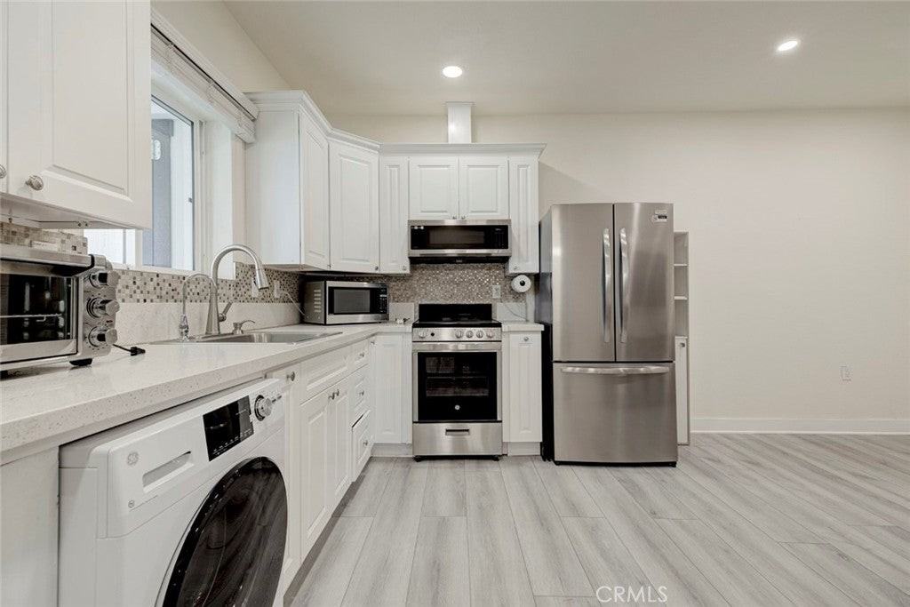 16615 Los Alimos St - Photo 6 of 10