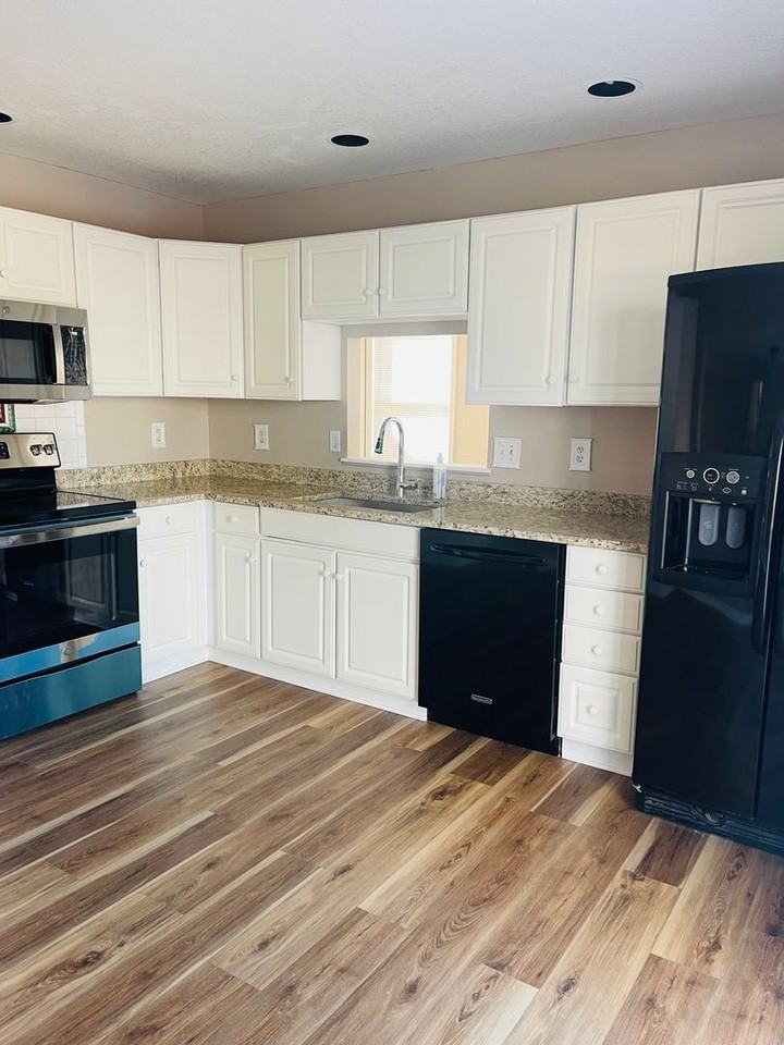 5361 S Dunkirk Way - Photo 5 of 14