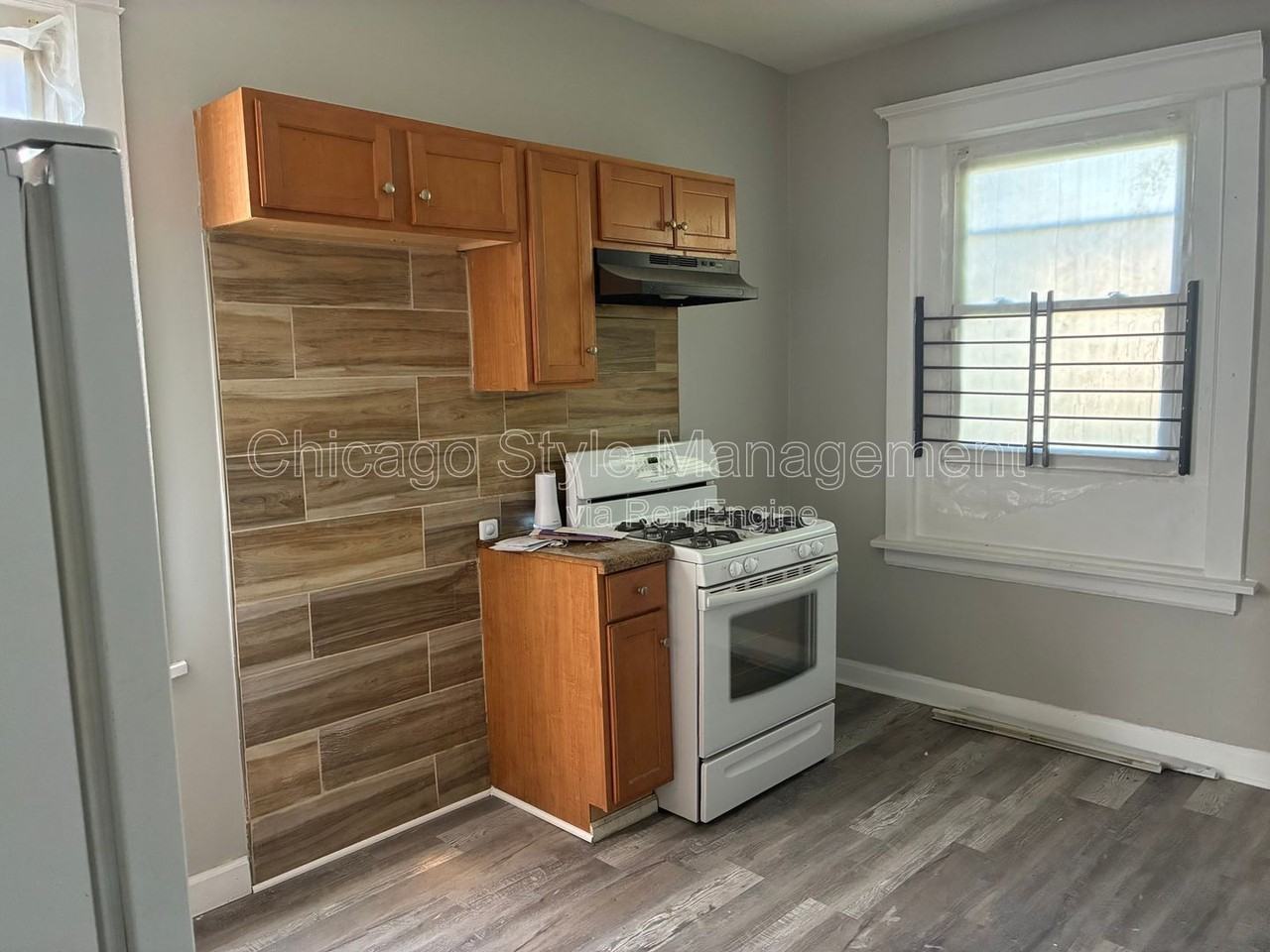 6952 S Ada St #1 - Photo 2 of 8
