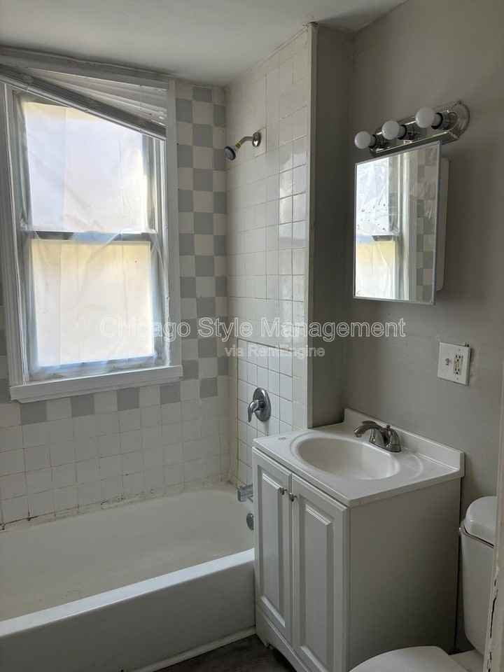 6952 S Ada St #1 - Photo 3 of 8