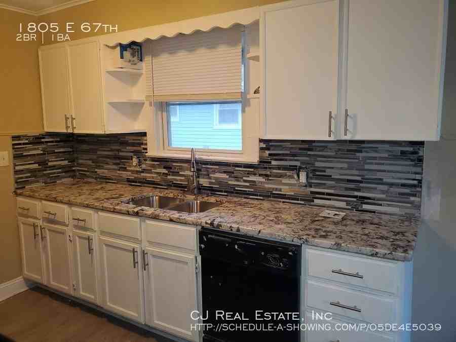 1805 E 67th Ter - Photo 6 of 7