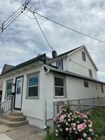 featured image of 7 W 6th St