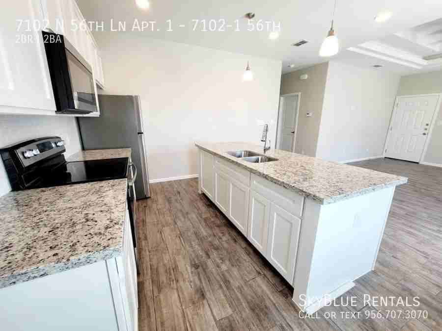 7102 N 56th Ln Apt 1 - Photo 6 of 14