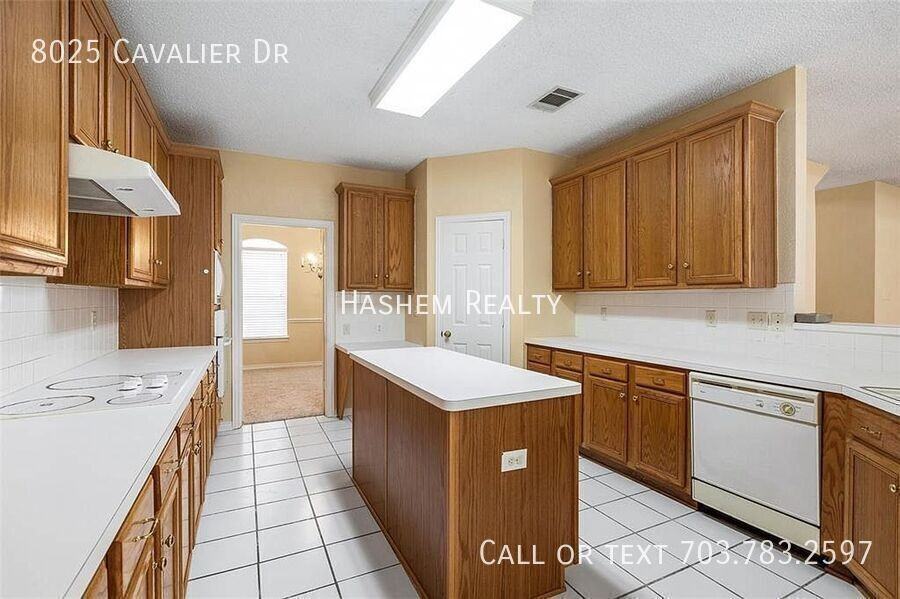 8025 Cavalier Dr - Photo 2 of 27
