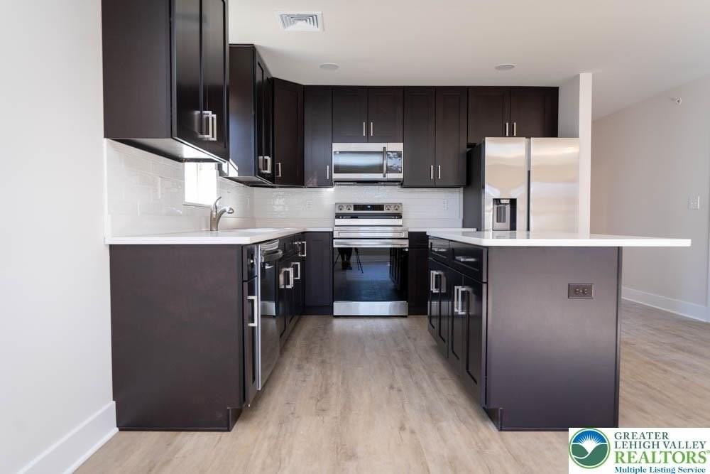 1275 E 4th St #202 - Photo 7 of 24