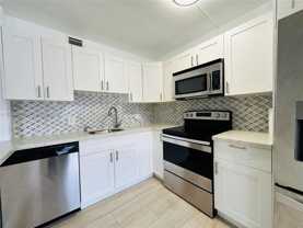 850 Sw 133rd Ter #105B - Photo 1 of 1