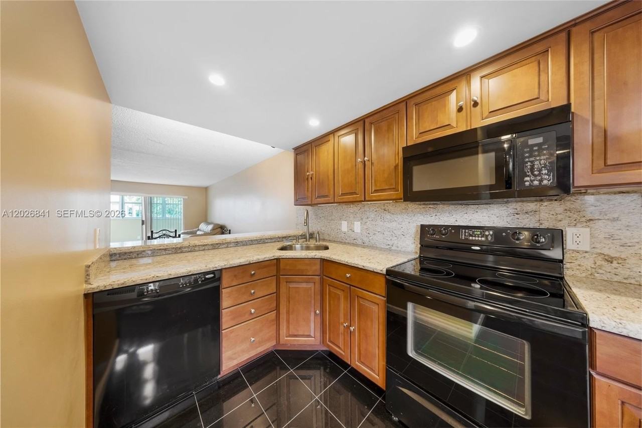 6075 N Sabal Palm Blvd #210 - Photo 2 of 32