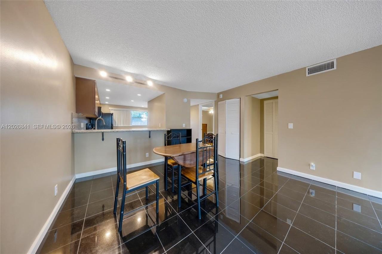 6075 N Sabal Palm Blvd #210 - Photo 5 of 32