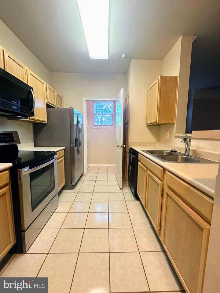1600 Spring Gate Dr - Photo 2 of 5