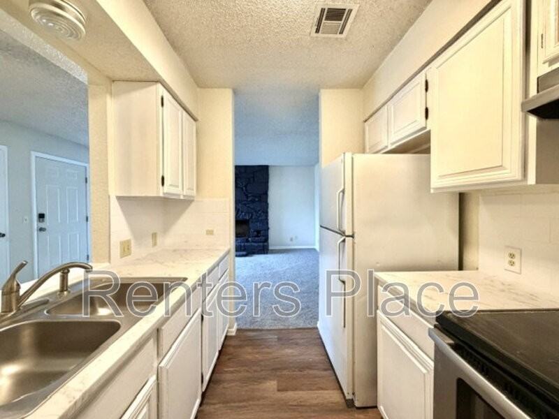 8215 N 117th East Ave - Photo 6 of 16
