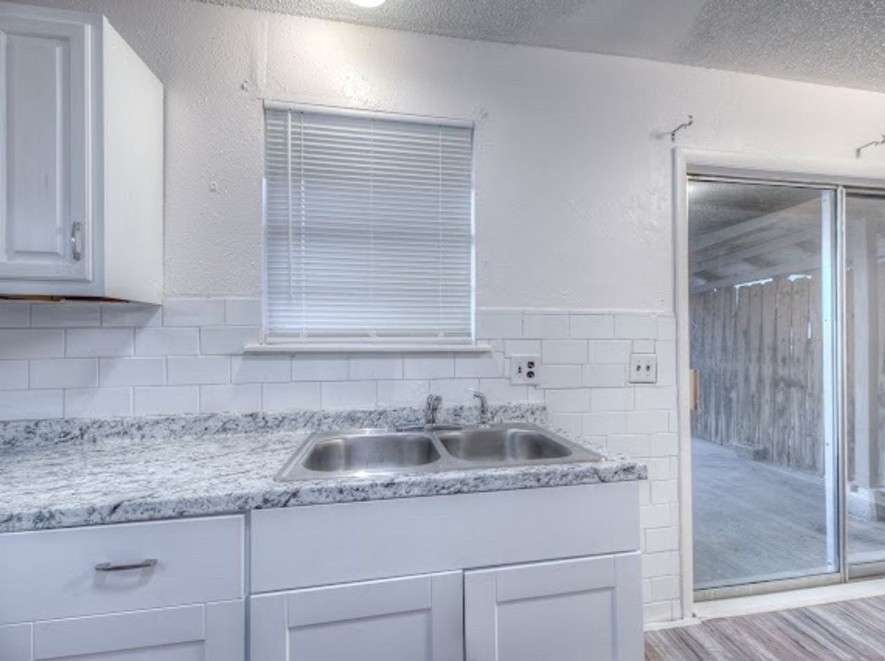 1129 S 124th East Ave - Photo 7 of 15