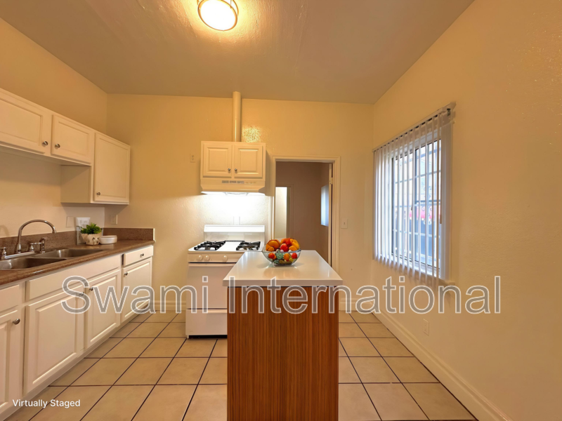 932 W 62nd St - Photo 2 of 19