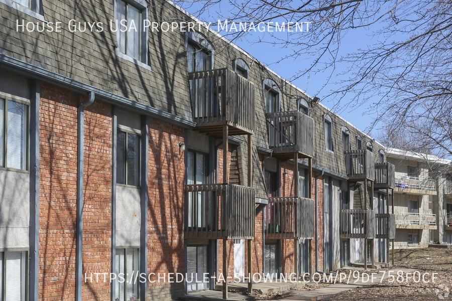 Hampton Court Apartments - Photo 2 of 25
