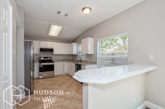 11220 Huxley Ave - Photo 5 of 17