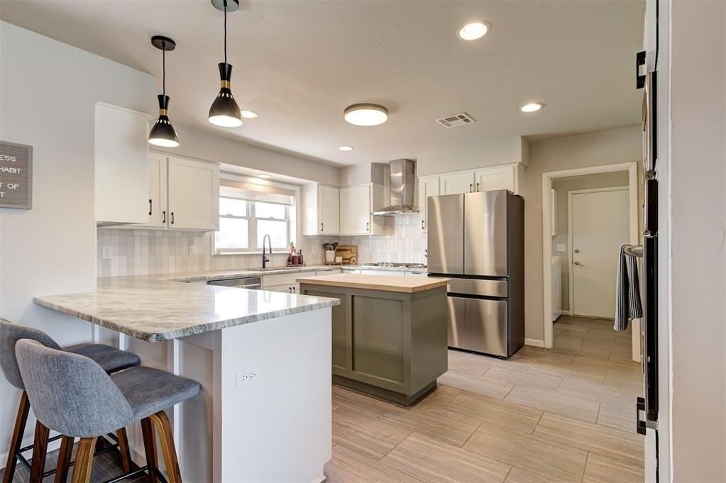 3127 Nw 69th St - Photo 4 of 50
