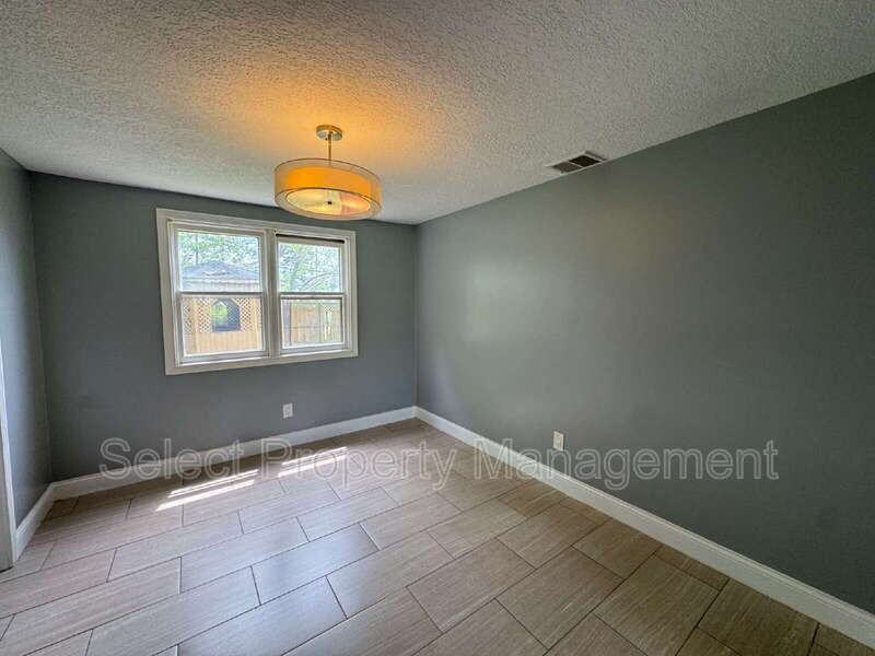 7021 Omaha Ct - Photo 4 of 23