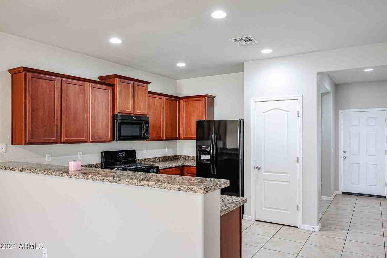 7009 S 78th Dr - Photo 7 of 34