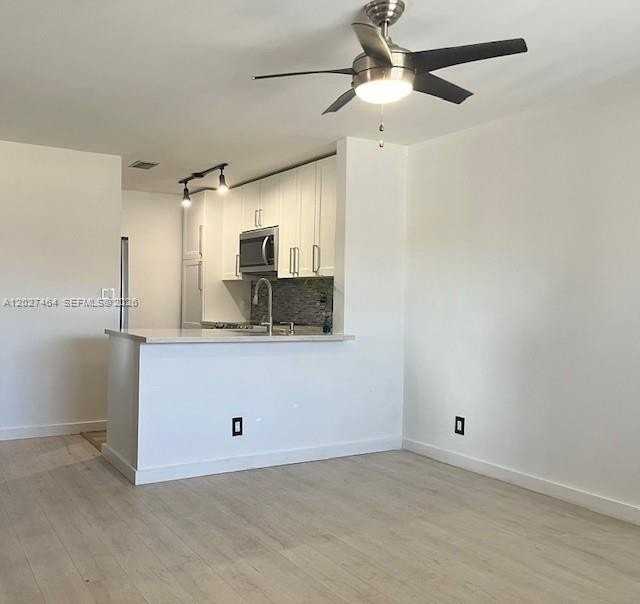 10054 Winding Lake Rd #201 - Photo 2 of 12