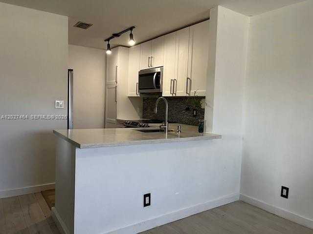 10054 Winding Lake Rd #201 - Photo 3 of 12