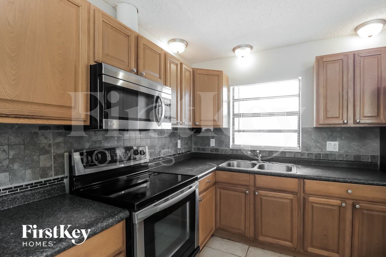 1180 Flintlock Ave Se - Photo 6 of 16