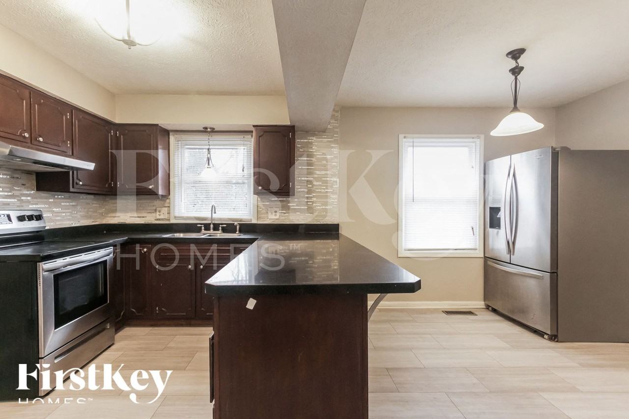 10725 Downing St - Photo 6 of 15
