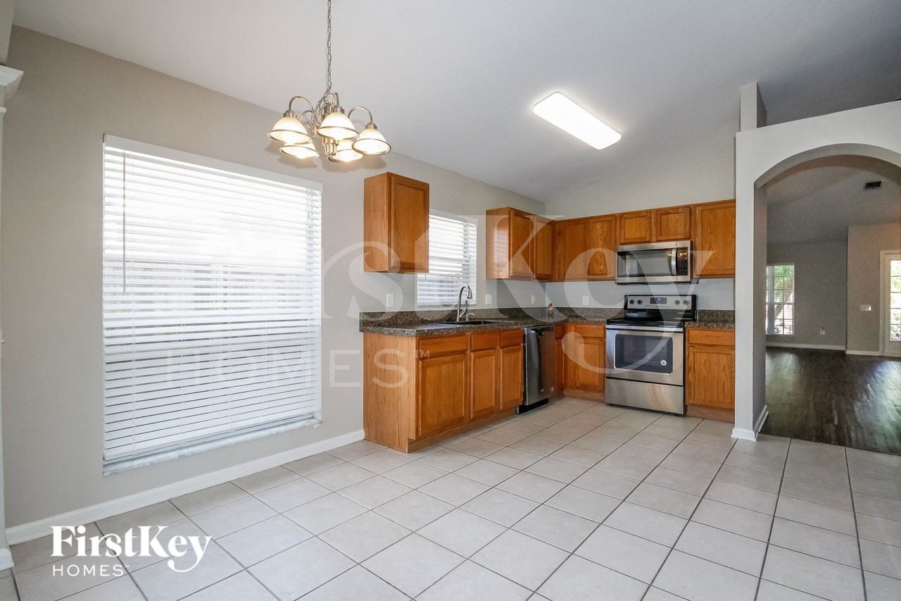 10214 Hunters Haven Blvd - Photo 7 of 15