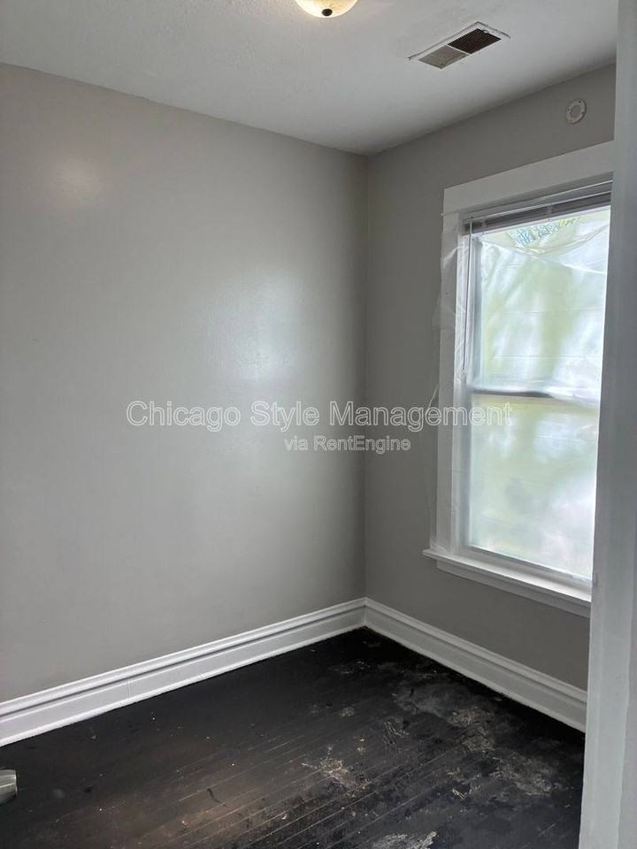 6952 S Ada St #2 - Photo 3 of 10