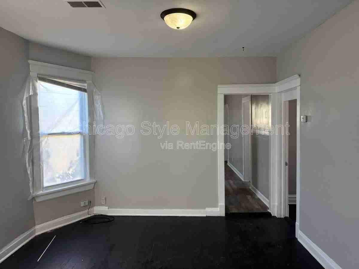 6952 S Ada St #2 - Photo 4 of 10
