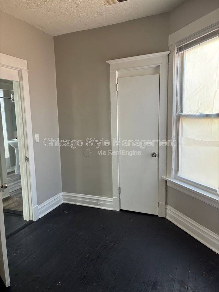 6952 S Ada St #2 - Photo 6 of 10