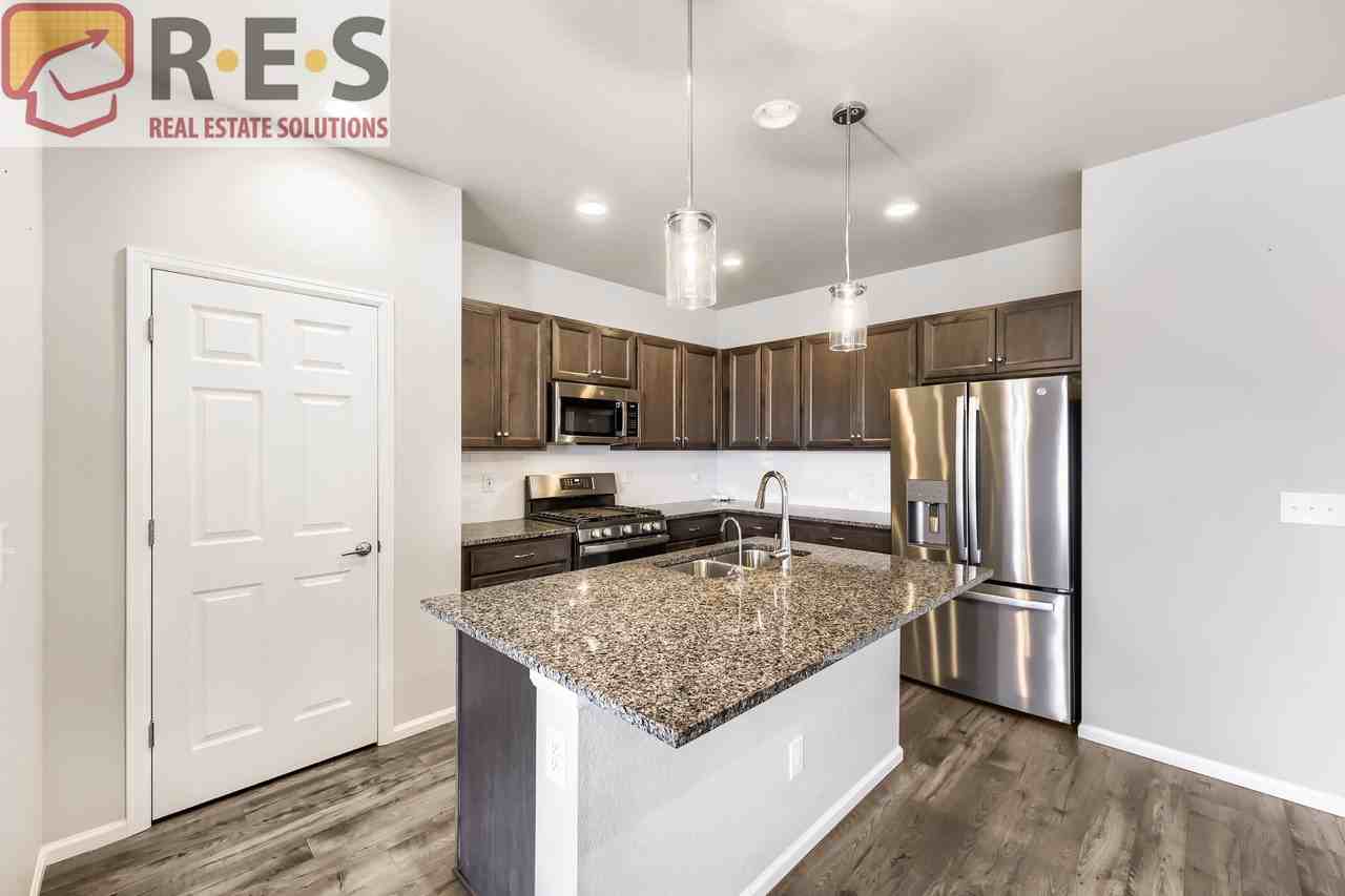 18950 E 65th Ave - Photo 4 of 17