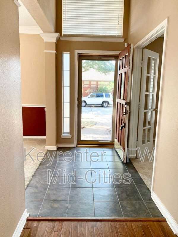 8702 Saddlehorn Dr - Photo 2 of 36