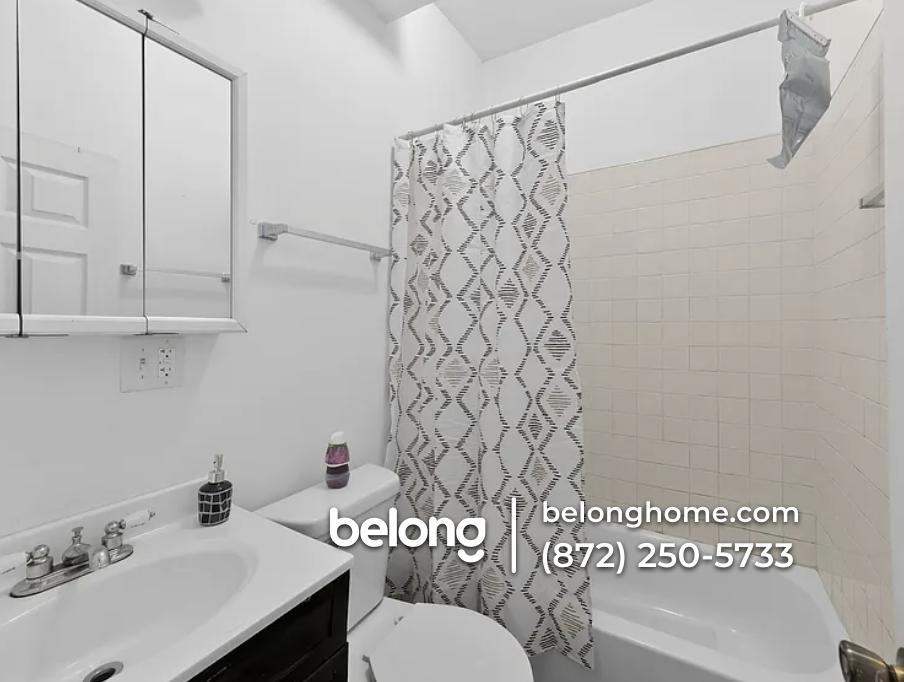 1144 W 68th St #2 - Photo 5 of 16