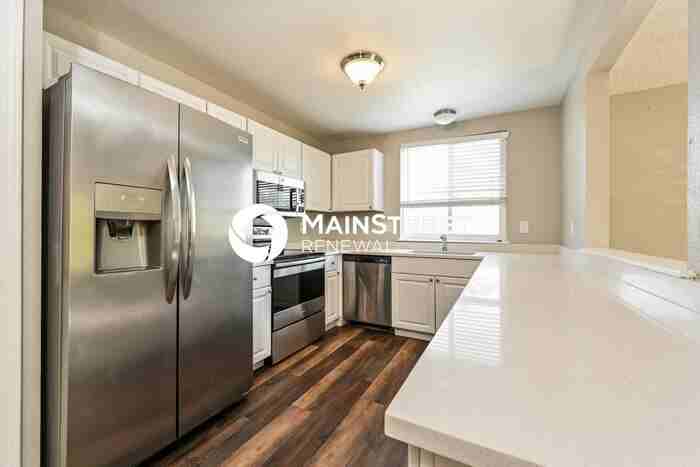 4275 S Halifax Way - Photo 7 of 17