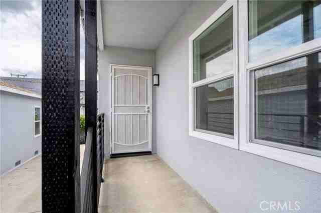 2519 Manhattan Ave - Photo 2 of 8