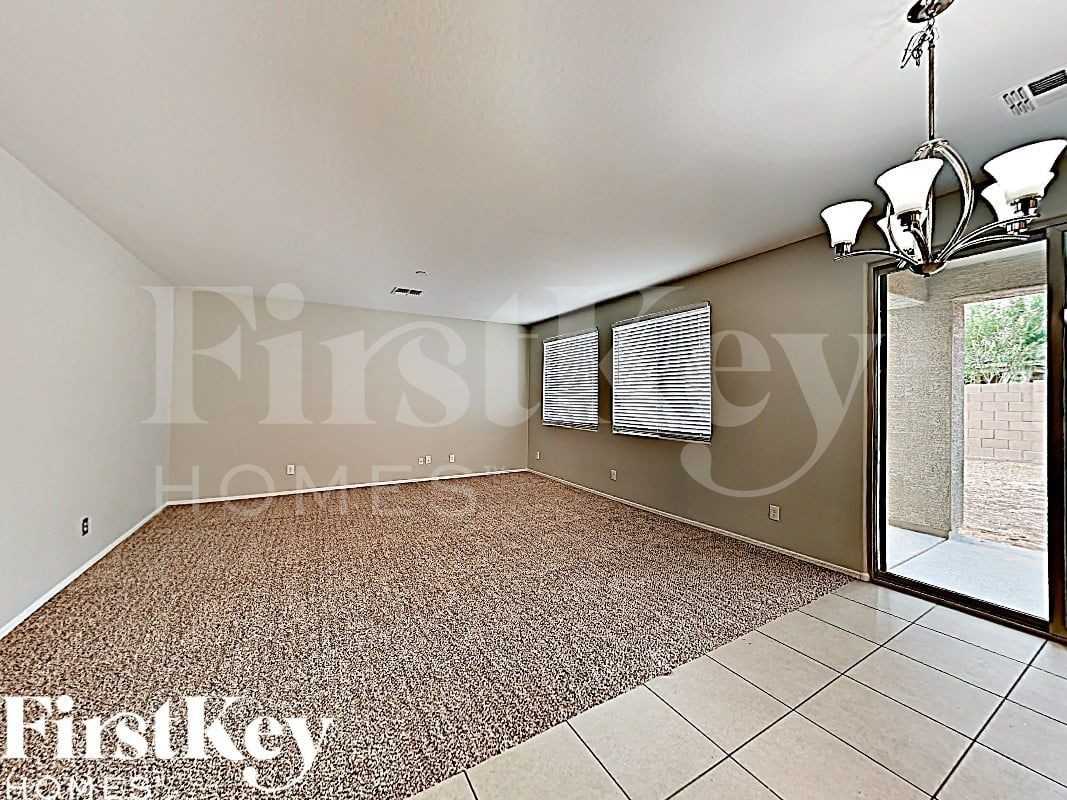 12061 W Rowel Rd - Photo 2 of 17