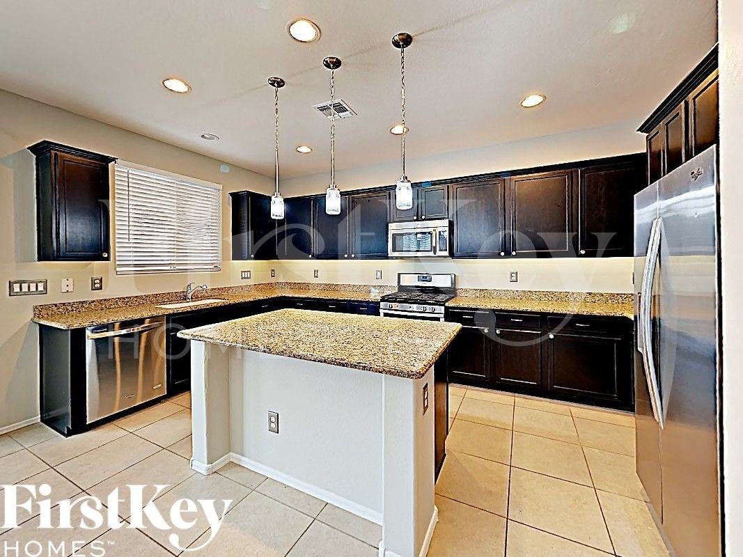 12061 W Rowel Rd - Photo 3 of 17