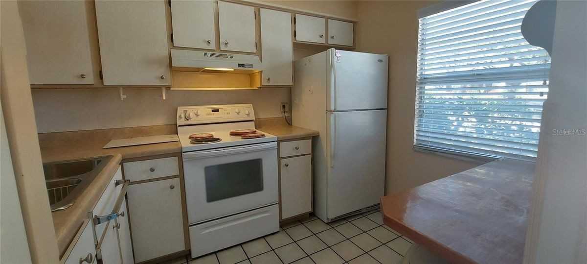 11620 Park Blvd ##209 - Photo 3 of 11