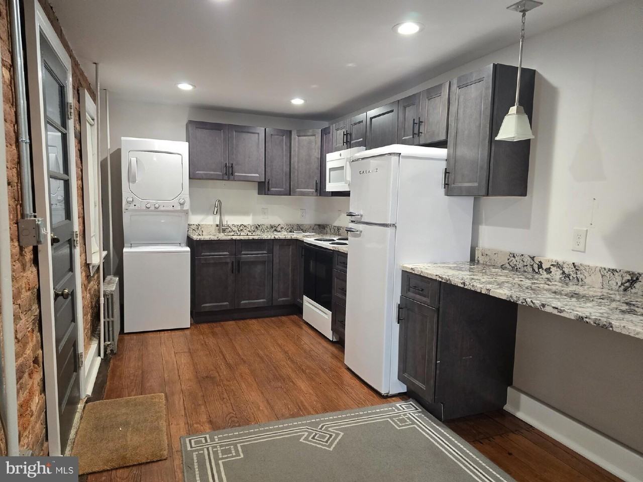 240 E 2nd St - Photo 2 of 9