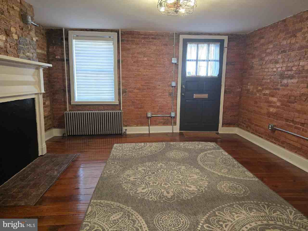 240 E 2nd St - Photo 3 of 9
