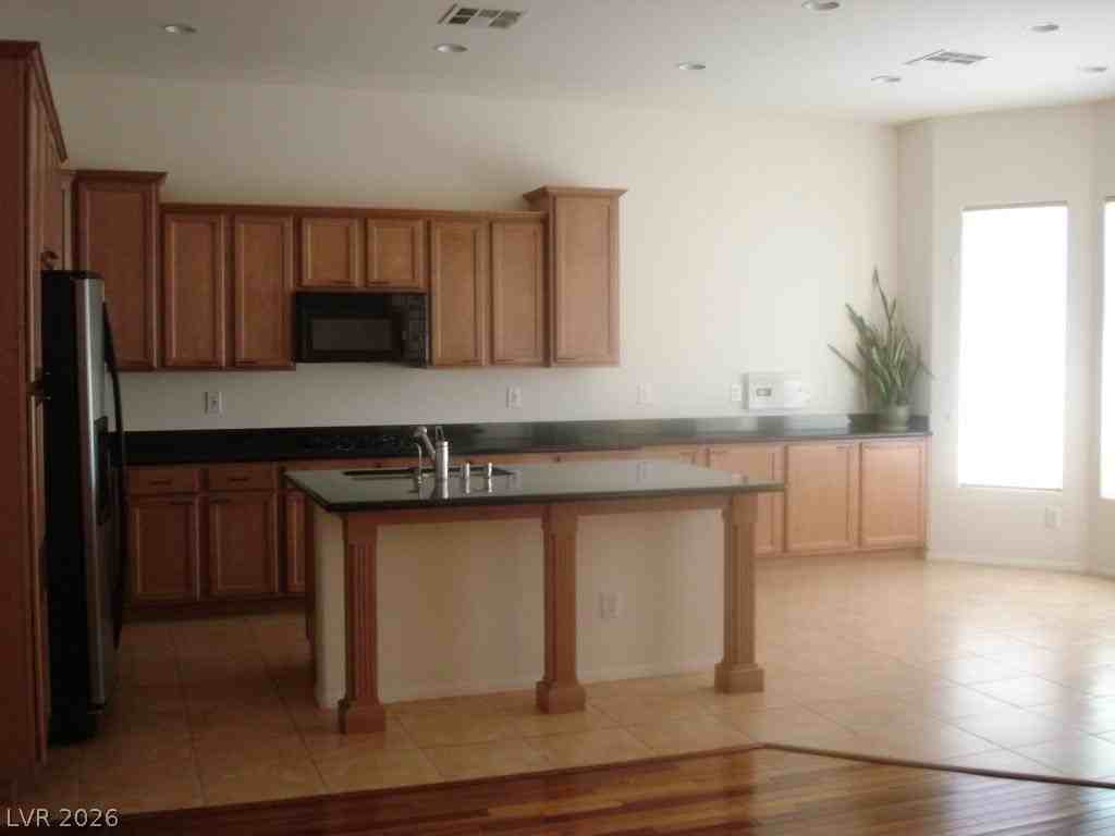 11749 Stonewall Springs Ave - Photo 6 of 16