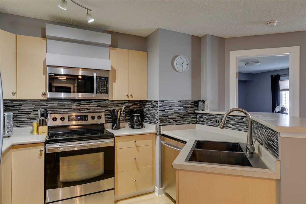Lovely 2 Bedroom Condo with 2 Parking Stalls! ALL Utilities INCLUDED (CP033) - Photo 7 of 14