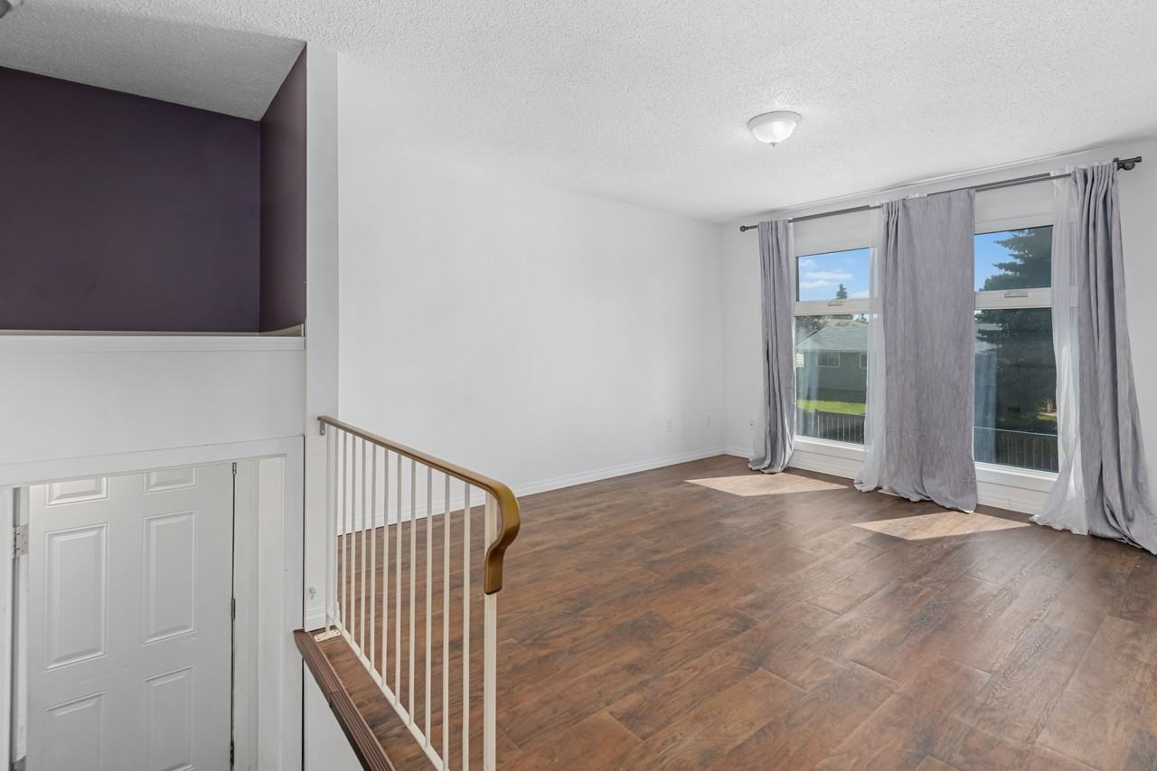 Bright & Spacious Upper Main Unit in Whitehorn - Photo 2 of 7