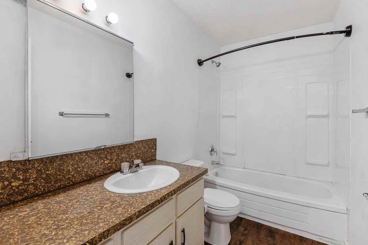 Bright & Spacious Upper Main Unit in Whitehorn - Photo 6 of 7
